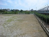 運動場の草刈りの画像